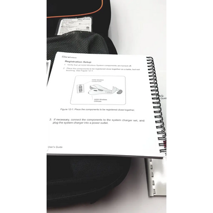 White spiral-bound user guide for bioness ness h200 wireless rehabilitation muscle stimulator system h2w-4100