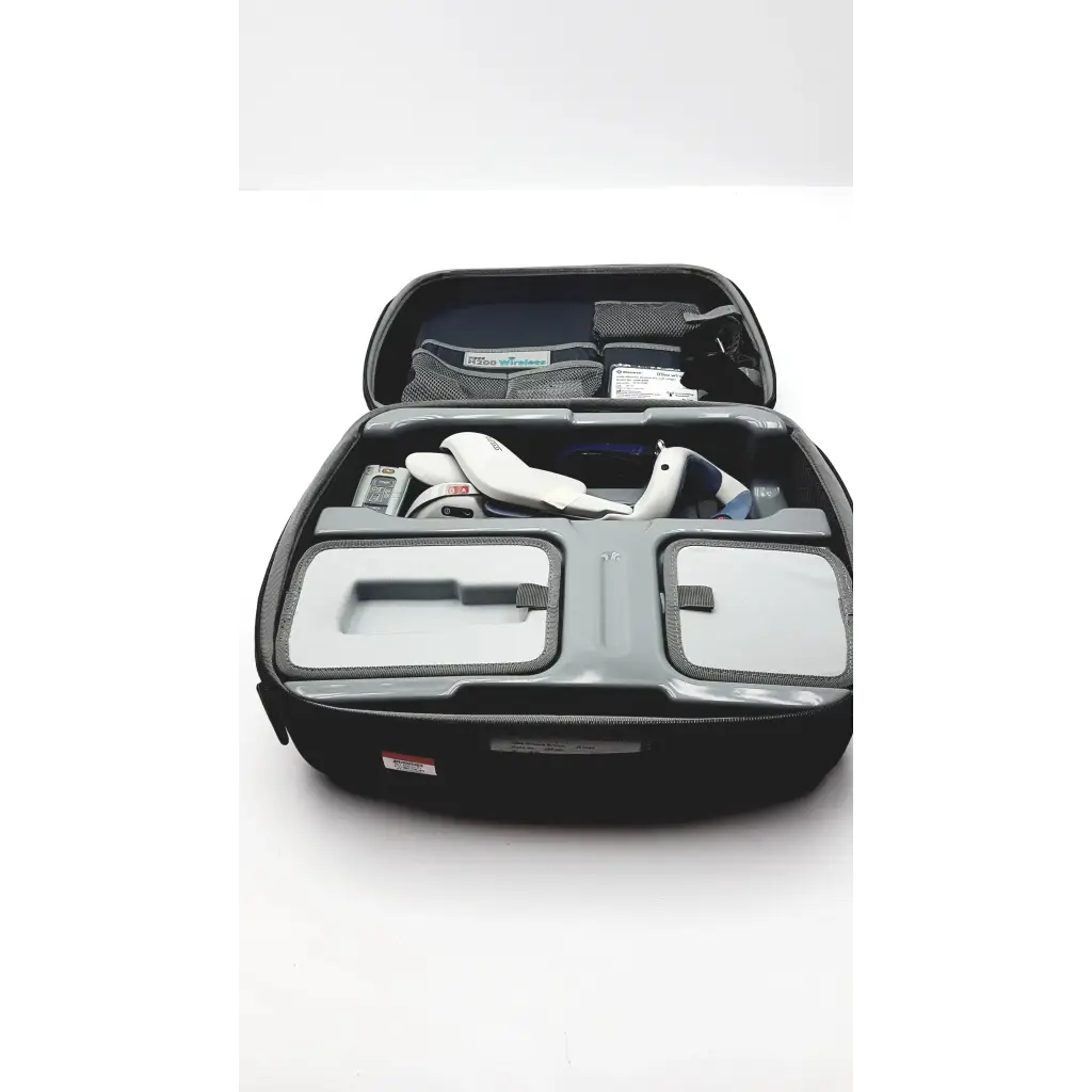 Black and gray hard-shell carrying case with molded compartments for white bioness ness h200 wireless rehabilitation vr headset and accessories