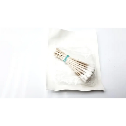 A clear plastic bag containing bioseal 9325/100 white cotton tip applicators with wooden sticks