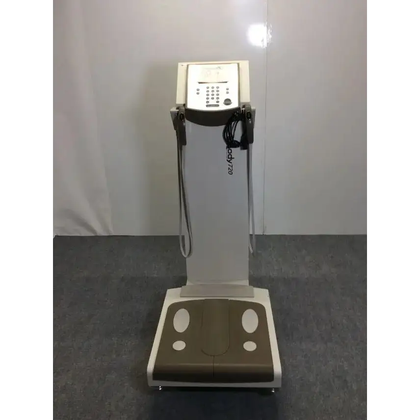 White and beige biospace inbody 720 body composition analyzer with digital display keypad and measurement straps