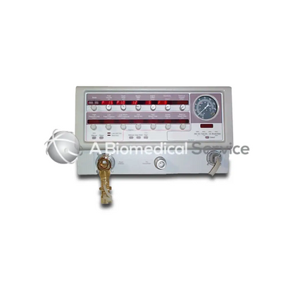 Gray bird 8400 STI medical ventilator with digital red display, control knobs, analog pressure gauge, and brass tubing connectors