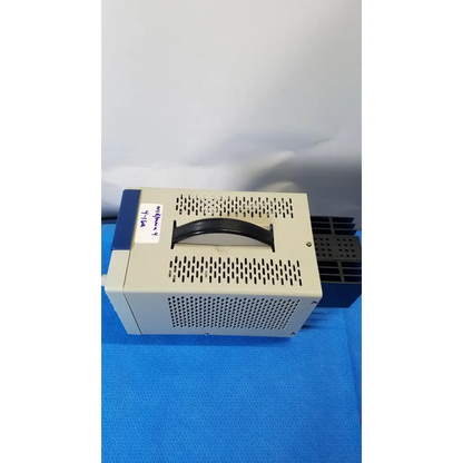 Beige and blue bk precision 1735a 30v digital dc power supply with perforated metal casing and magnifier y 4-10x label