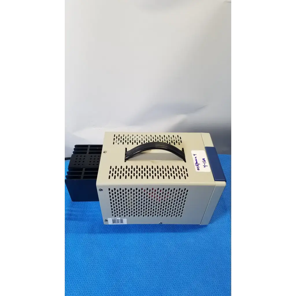 Beige and blue bk precision 1735a 30v digital dc power supply with black handle and ventilation grilles for industrial use