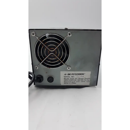 Black bk precision model 1688 dc power supply with circular fan and two black knobs for precise voltage control