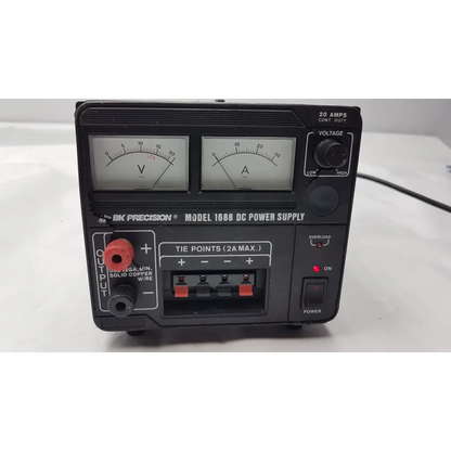 Bk precision model 1688 black dc power supply with two analog meters and red tie points for precise voltage control