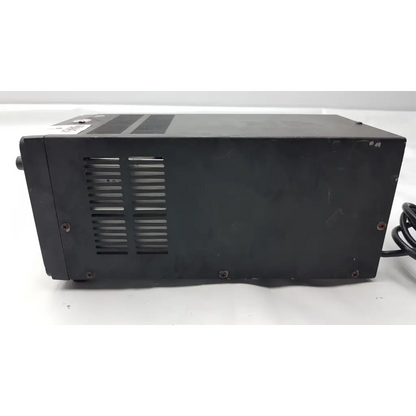 Black b&k precision model 1688 dc power supply with ventilation slats and coiled power cord side view