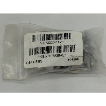 A clear plastic bag containing metallic blade locking screws 2699 for 5.2mm suction punch with white label