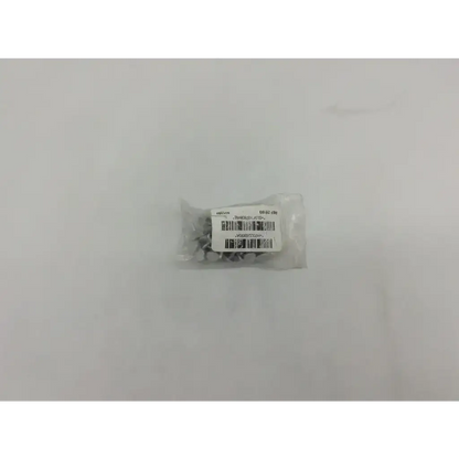 A clear plastic bag containing silver metallic blade locking screws for 5.2mm suction punch or 2mm suction punch