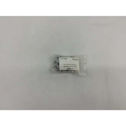 A clear plastic bag of silver blade locking screws 2699 for 5.2mm suction punch or 2mm suction punch use