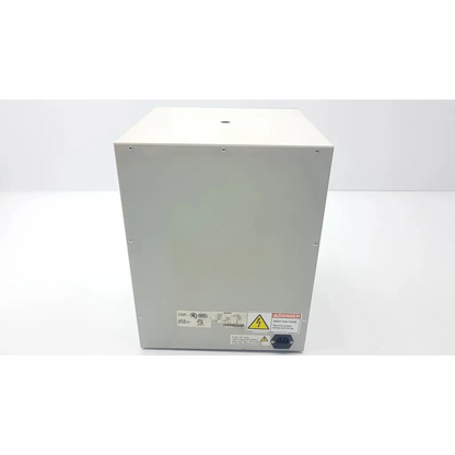White metal industrial power supply unit with warning labels and power input port on the back of boekel scientific analog benchtop incubator