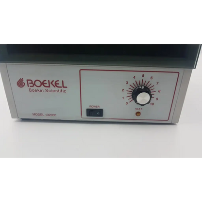 Silver-colored boekel scientific 132000 analog benchtop incubator with black rotary dial and power switch
