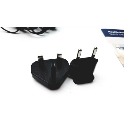 Black plastic travel adapter plugs with metallic pins uk and european styles for bosch health buddy telemedicine system