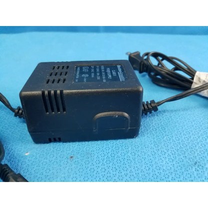 Black plastic boston acoustics dk1201a5-1an power supply with coiled cord and side ventilation slots