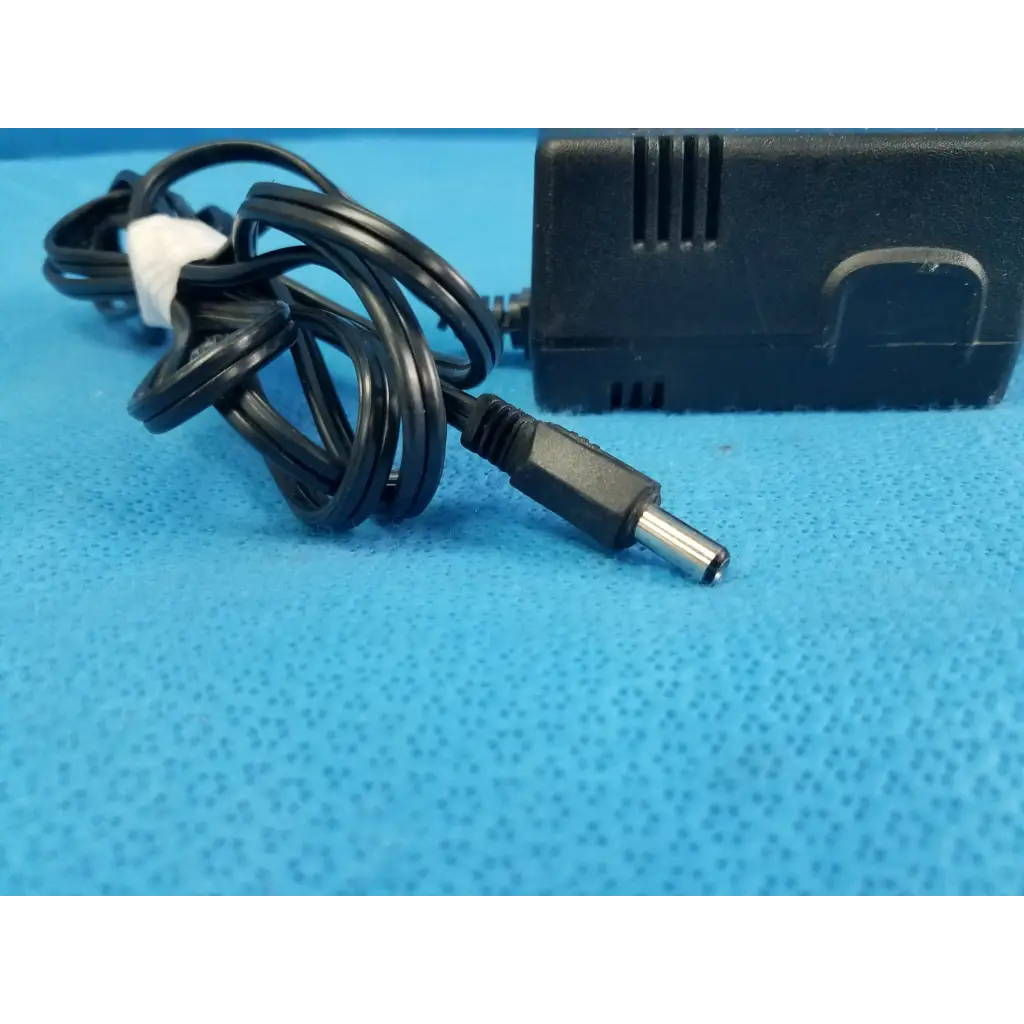 Black plastic boston acoustics dk1201a5-1an power supply with coiled cable and metallic connector for 12vac 1500ma use