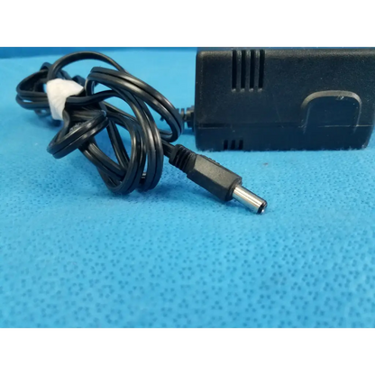 Black plastic boston acoustics dk1201a5-1an power supply with coiled cable and metallic connector for 12vac 1500ma use