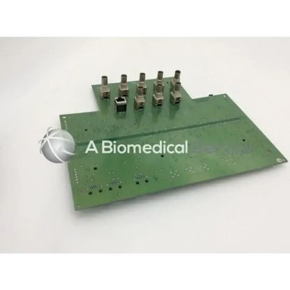 Green rectangular circuit board with metallic connectors and solder points for boston scientific galaxy ultrasound pca isolation video and buffer board