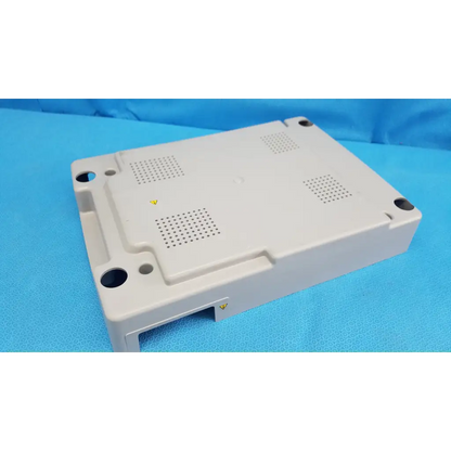 Beige base shroud plastic cover with ventilation grilles and mounting holes for trc-nw6s retinal camera