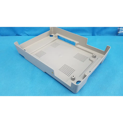 Beige plastic base shroud plastic cover panel with perforated ventilation and mounting holes for topcon trc-nw6s retinal camera