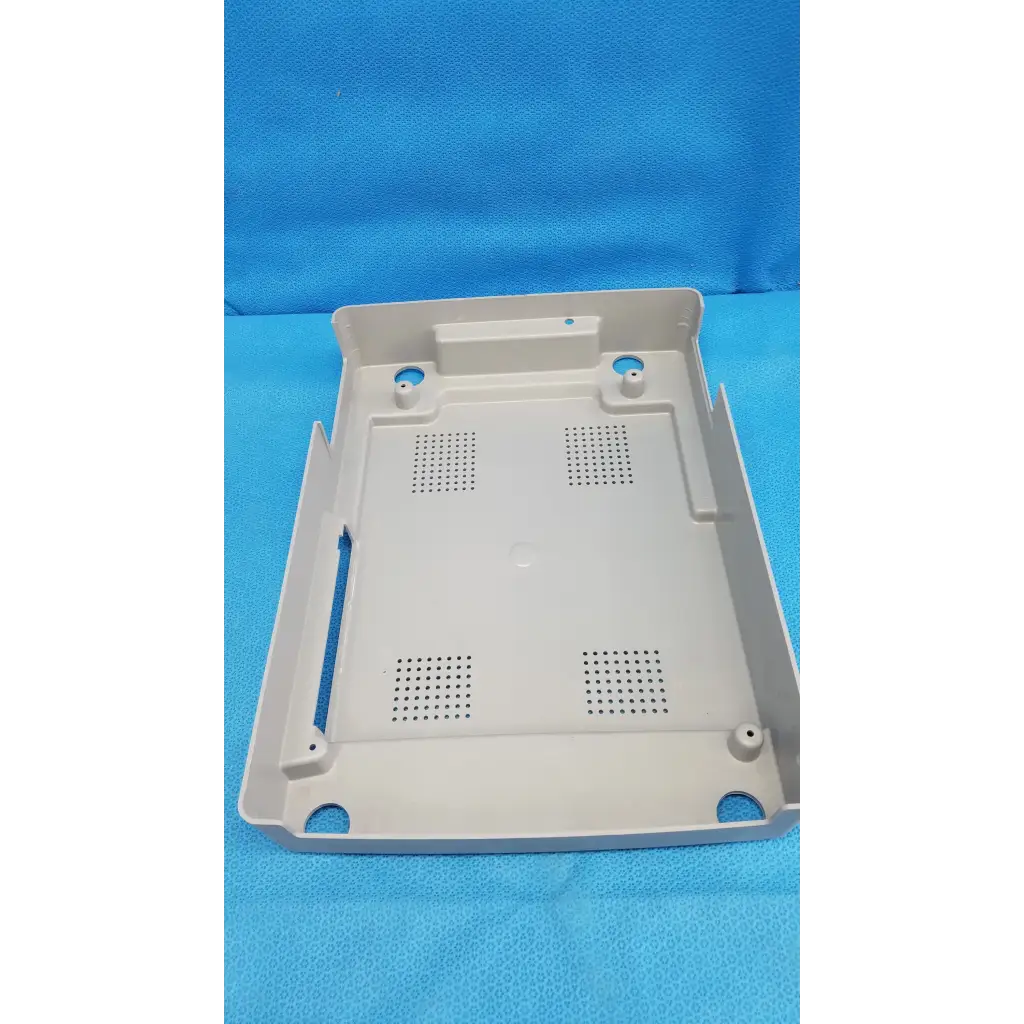 Beige base shroud plastic cover panel with perforations and mounting holes for trc-nw6s retinal camera