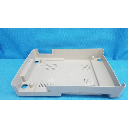 Beige base shroud plastic cover panel with ventilation and mounting holes for topcon trc-nw6s retinal camera back side