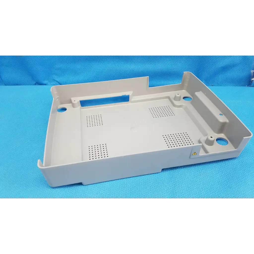 Beige base shroud plastic cover panel with perforated sections and mounting holes for trc-nw6s retinal camera