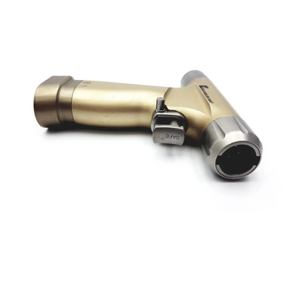 Gold-colored brasseler modular orthopedic surgical drill with silver safety switch and blackened metal tip in pm-x08-700 design