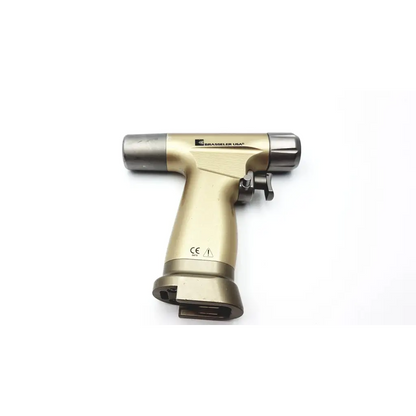 Gold-colored brasseler modular orthopedic surgical drill with metallic finish and ergonomic design for precise use