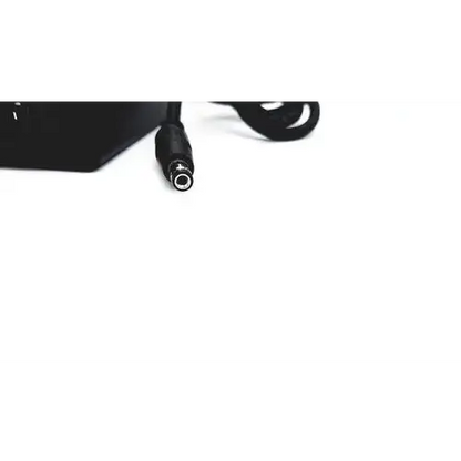 Black power adapter with coiled cable and cylindrical connector for bridgepower corp bpm050s12f02 medical power supply
