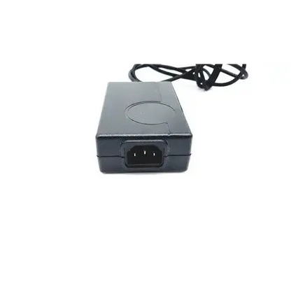 Black plastic power adapter with coiled cable for bridgepower corp bpm050s12f02 medical power supply unit