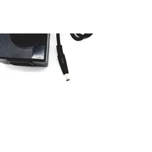 Black plastic laptop charger with coiled power cord and cylindrical connector for bridgepower corp bpm050s12f02 medical power supply