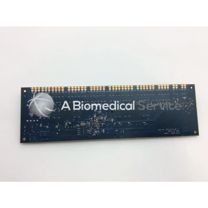 Dark blue door slave board with gold contact pins and silver globe logo labeled a biomedical service brivo 1181-01-001-0102