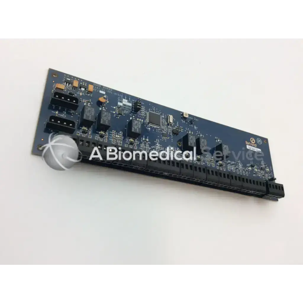 Black rectangular Brivo 1181-01-001-0102 door slave board with electronic components and connectors for access control