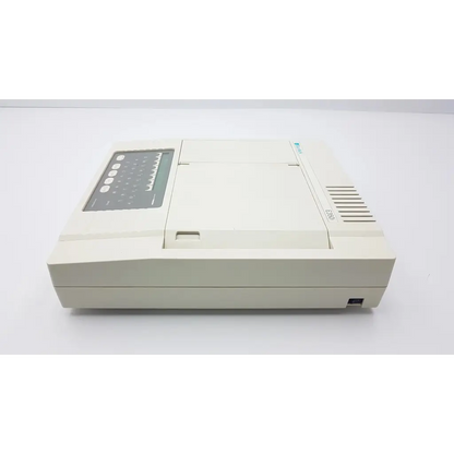 Cream-colored rectangular burdick e350i electrocardiograph with digital keypad and display panel on left side