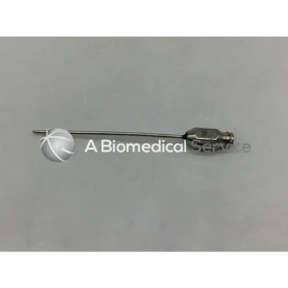 A sleek metallic byron col-117 infiltration cannula with cylindrical handle and fine pointed tip for precise injections