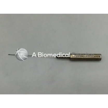Gold-colored Byron Col-Mini II-S 070628-08 infiltration cannula style with white spherical tip and engraved handle markings