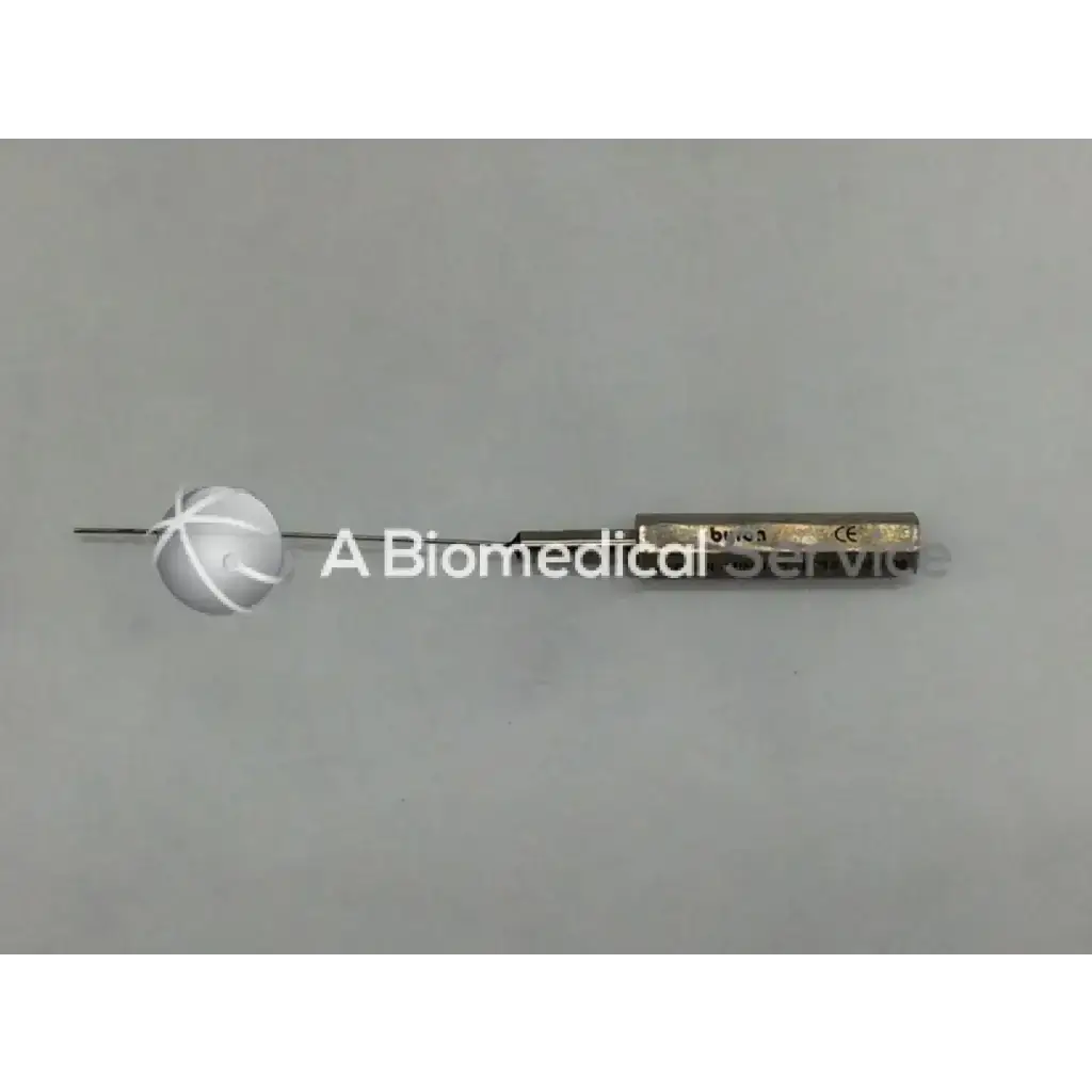 Byron Col-Mini II-S metallic infiltration cannula style needle with white spherical tip and engraved barrel for medical use