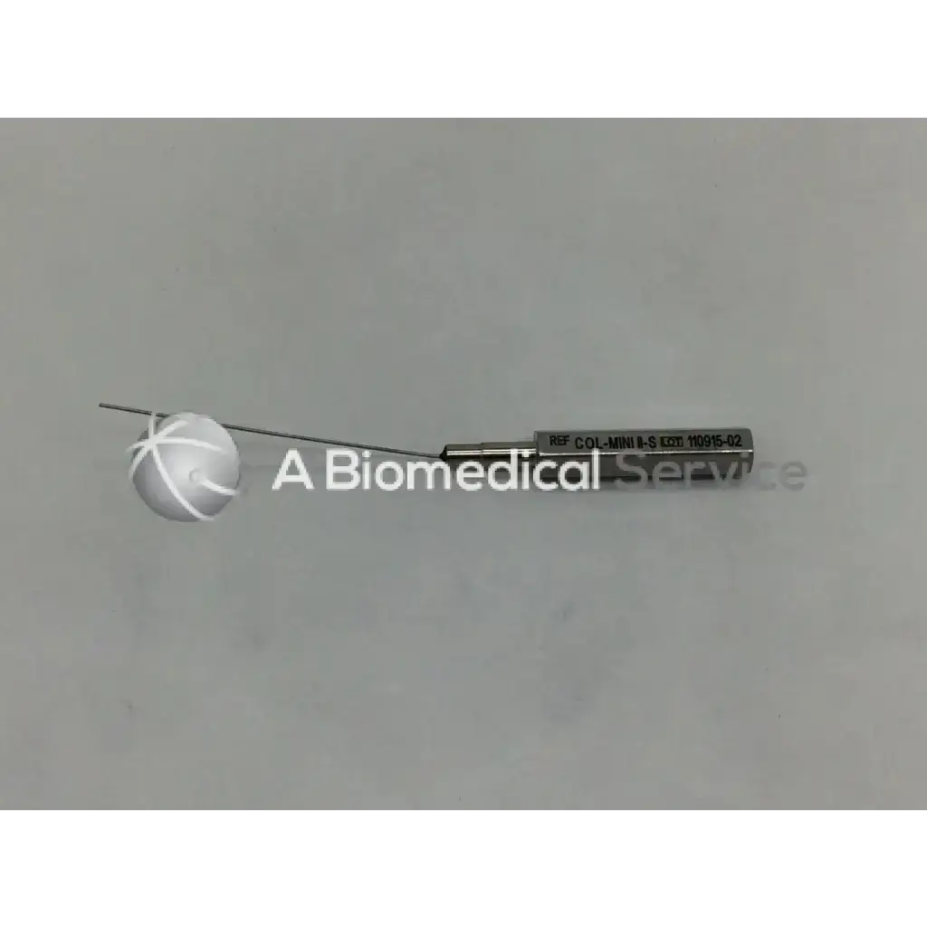 Silver surgical infiltration cannula style instrument with spherical tip and engraved reference number on handle