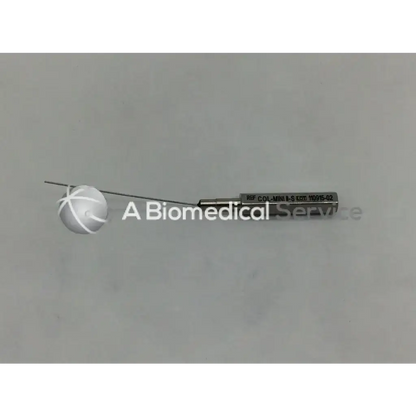 Silver surgical infiltration cannula style instrument with spherical tip and engraved reference number on handle