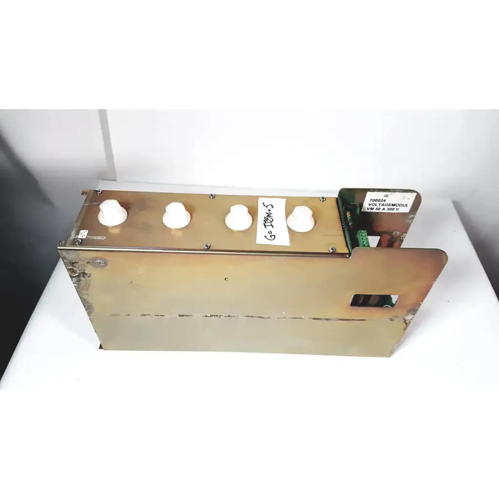 Brass-colored metal module vm 50a with four white knobs and green circuit board for 50a 300v power supply by bystronic