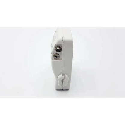 White plastic cadd-legacy 6300 pump with two silver audio jacks and curved clip showing back side ac5-376 2923sm