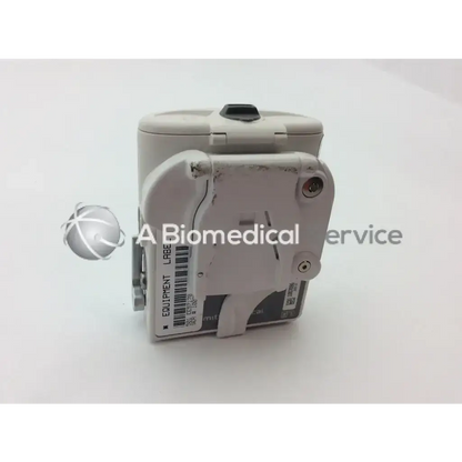 Gray plastic cadd solis vip 2120 infusion pump with hinged lid and attached label for medical use