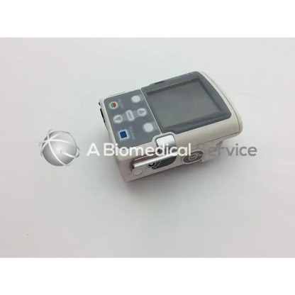 Gray and white cadd solis vip 2120 infusion pump with digital display control buttons and tubing port for medical use