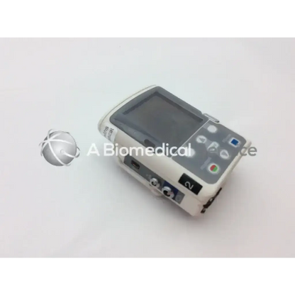 White medical cadd solis vip 2120 infusion pump with gray touchscreen and multiple colored buttons for precise dosing