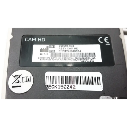 Black ge medical systems cam hd assembly with white labeling and barcode stickers on the cam14 hd collection box aha iec common