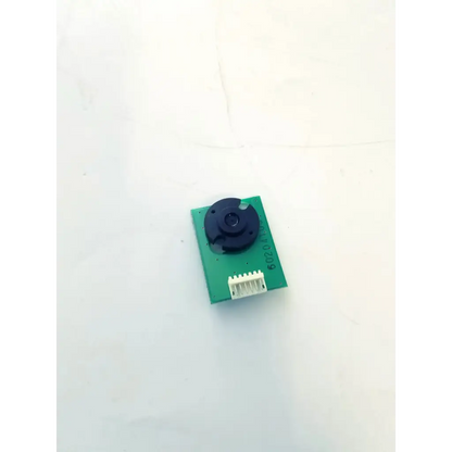 Green circuit board with black circular component and white connector on the canon bh8-2581-02 board