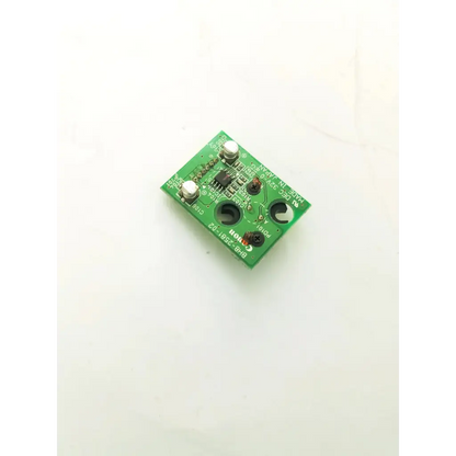 Green rectangular canon bh8-2581-02 board with silver soldered components and black printed text on circuit board surface
