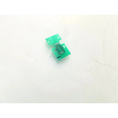 Green plastic canon bh8-2625-01 board with silver solder joints and mounting holes for electronic assembly