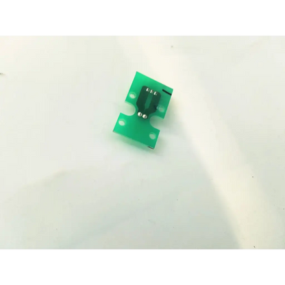 Green plastic canon bh8-2625-01 board with black integrated circuit and silver solder points for electronic use