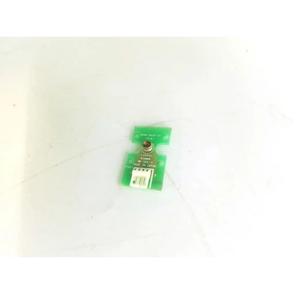 Green plastic canon bh8-2625-01 board printer component with metallic connector and white rectangular interface