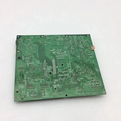 Green rectangular canon image prograf ipf-5000 main board with intricate silver traces and mounted electronic components